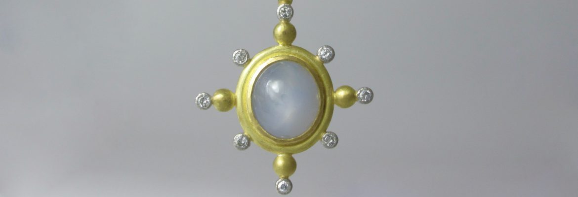 star sapphire, diamond gold star pendant